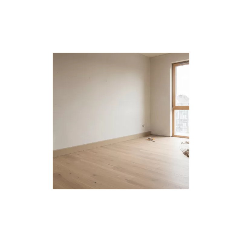 Plinthes MDF brut bord arrondi 70 × 12 mm posées dans une pièce